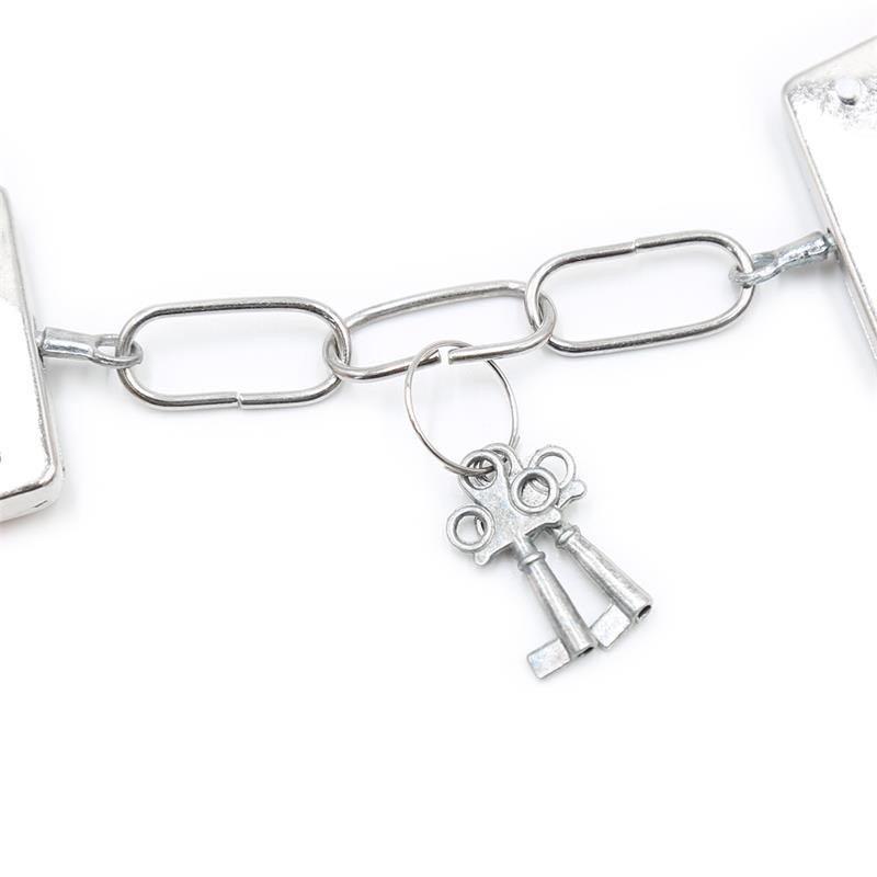 menottes en metal pour poignées avec franges rose