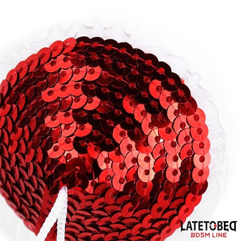 nipples avec paillettes rouges et Pompones blancs