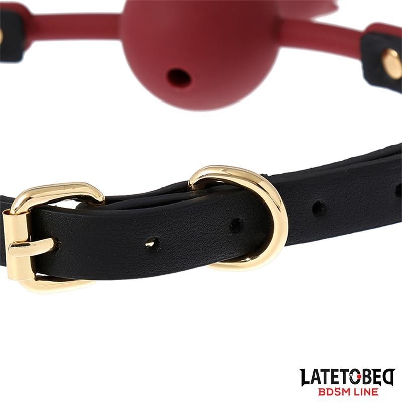 baillon boule silicone Transpitable ornement rose reglable 47-56 cm